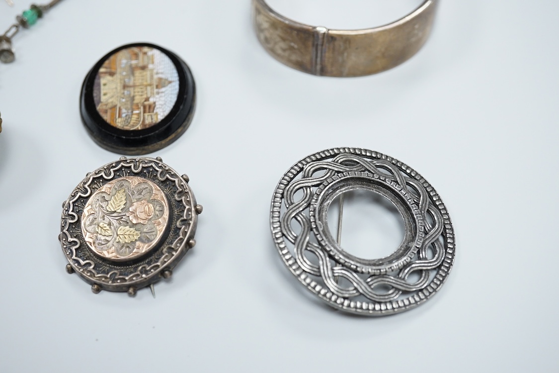 A group of mainly antique jewellery including micro-mosaic plaque, a pair of 9ct and coral drop earrings, a silver bangle, a George V enamel and silver brooch(a.f.) etc.